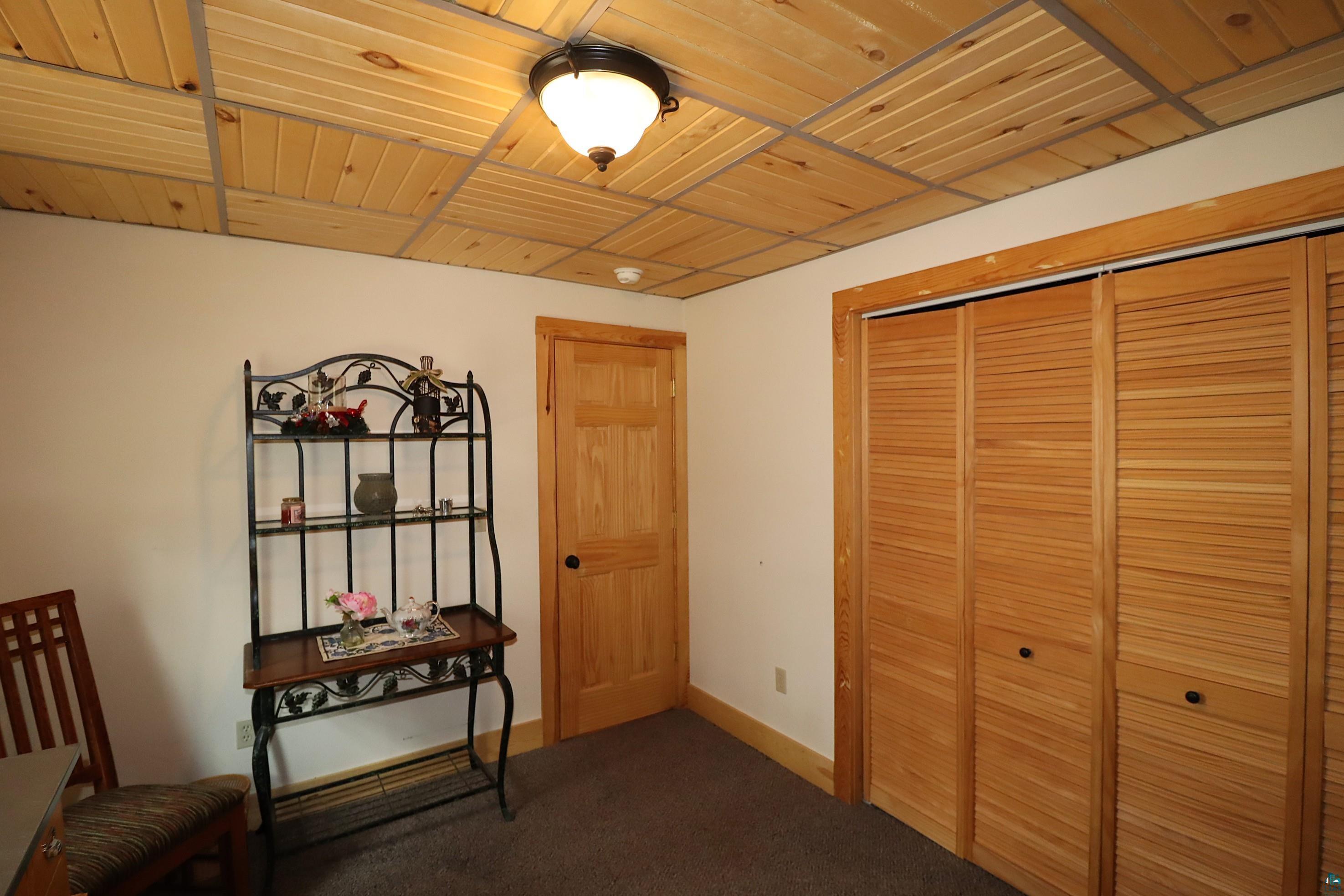 23540 State Highway 13 Cornucopia, WI 54827 - Photo 21 of 40 Main Level Bedroom