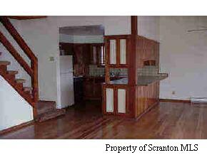 58 John Sheehan Road Mehoopany, PA 18629 - Photo 3 of 5 a black and white photo of a living room