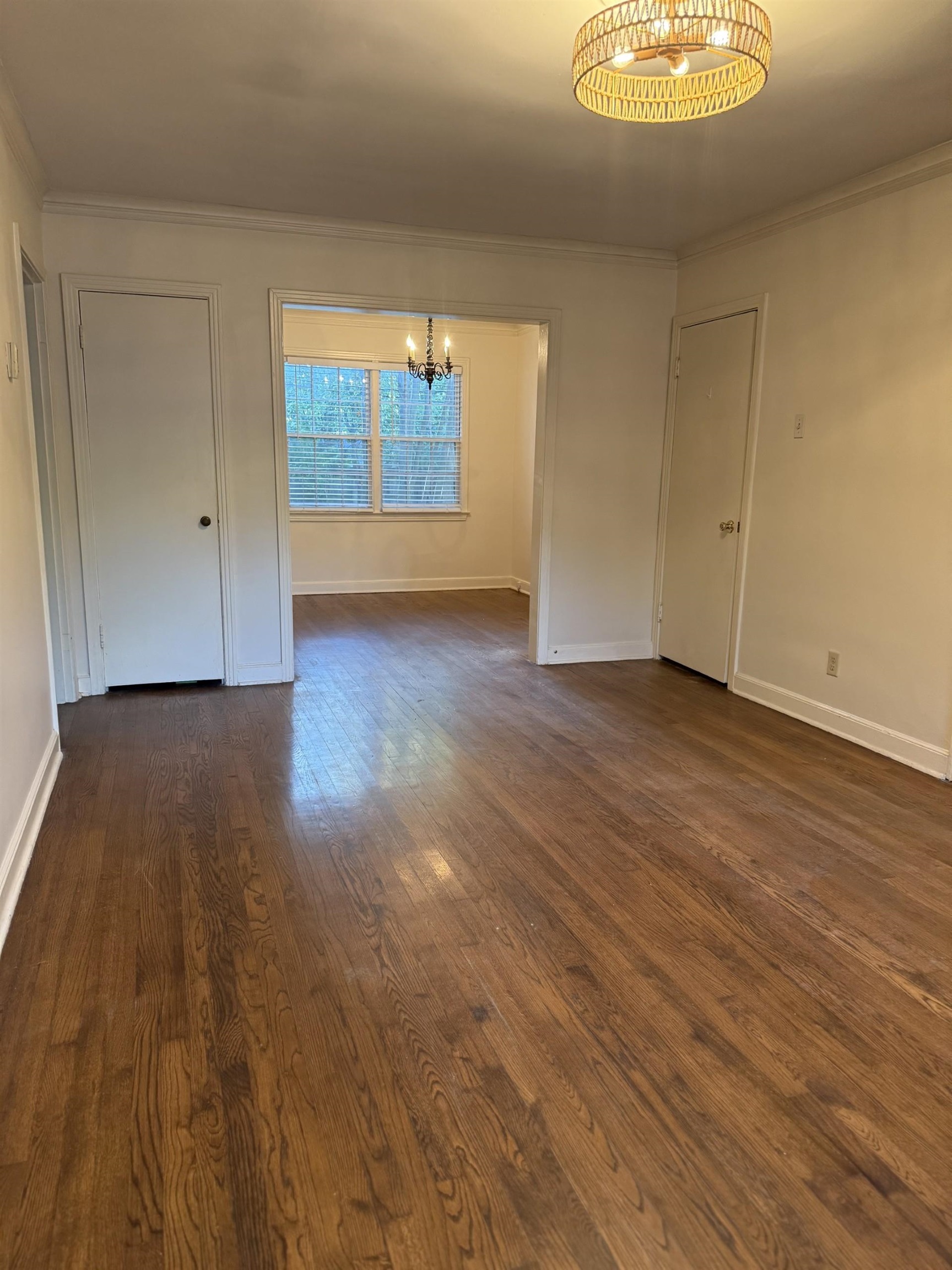 695 Berry Road Memphis, TN 38117 - Photo 27 of 32 an empty room with wooden floor and windows
