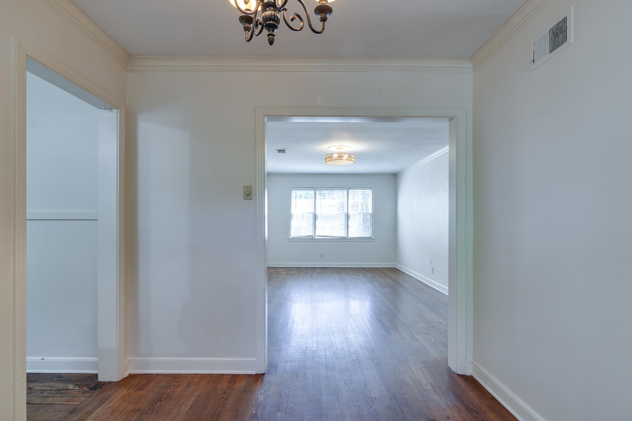 695 Berry Road Memphis, TN 38117 - Photo 8 of 32 a view of a livingroom with wooden floor