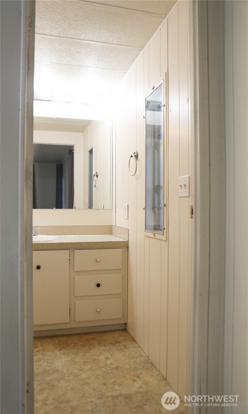 410 Totem Pole Road Manson, WA 98831 - Photo 17 of 27 a bathroom with a sink and a mirror