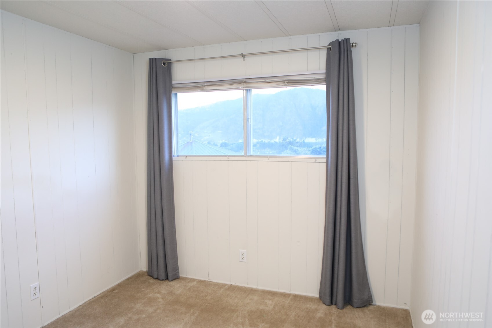 410 Totem Pole Road Manson, WA 98831 - Photo 21 of 27 a view of a room that has a window