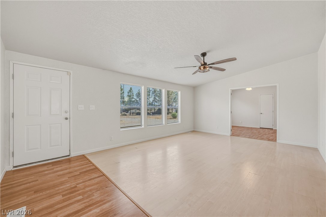 1890 West Dyer Road Pahrump, NV 89048 - Photo 30 of 40 Bright and airy living area with ample natural light and seamless flow.