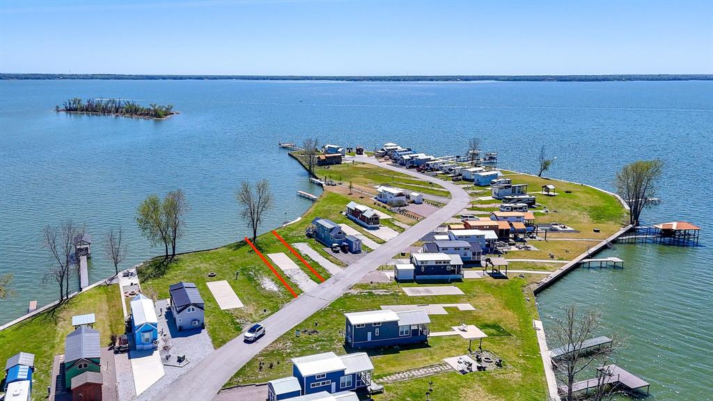 Lot 118 Peninsula Road Kerens, TX 75144 - Photo 15 of 37 a bedroom with bed and a table