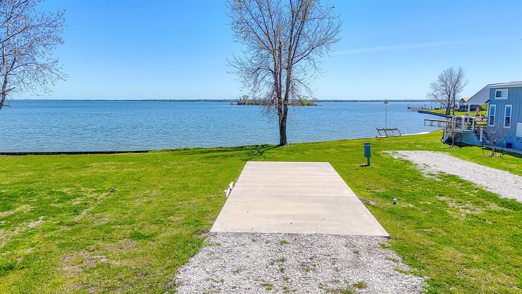 Lot 118 Peninsula Road Kerens, TX 75144 - Photo 19 of 37 a view of a garden with an outdoor space
