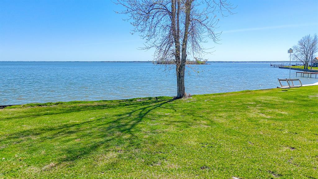 Lot 118 Peninsula Road Kerens, TX 75144 - Photo 21 of 37 a view of a yard with an ocean view