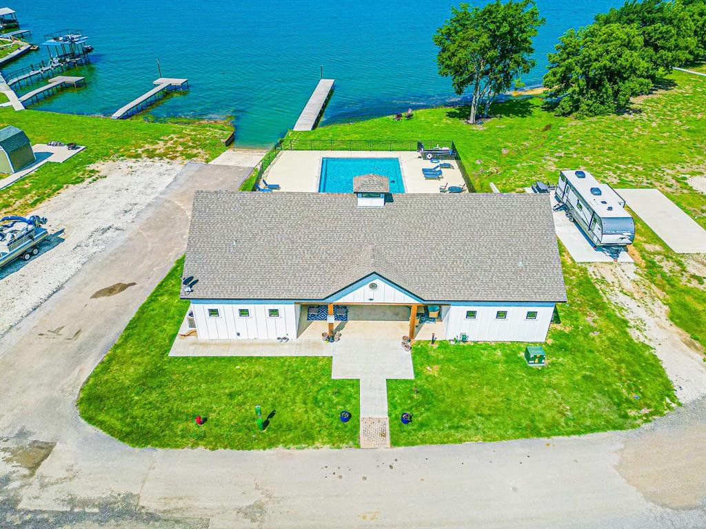 Lot 118 Peninsula Road Kerens, TX 75144 - Photo 24 of 37 a view of yard with swimming pool and outdoor seating
