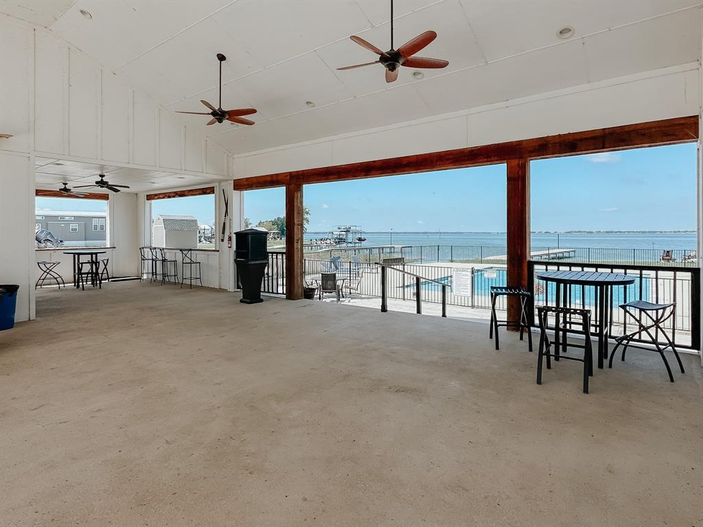 Lot 118 Peninsula Road Kerens, TX 75144 - Photo 31 of 37 a living room with furniture and a large window