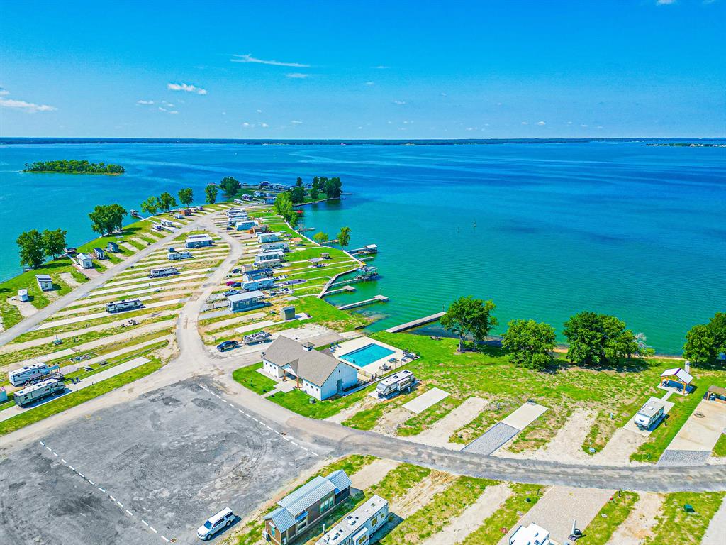 Lot 118 Peninsula Road Kerens, TX 75144 - Photo 37 of 37 a view of an outdoor space with a swimming pool