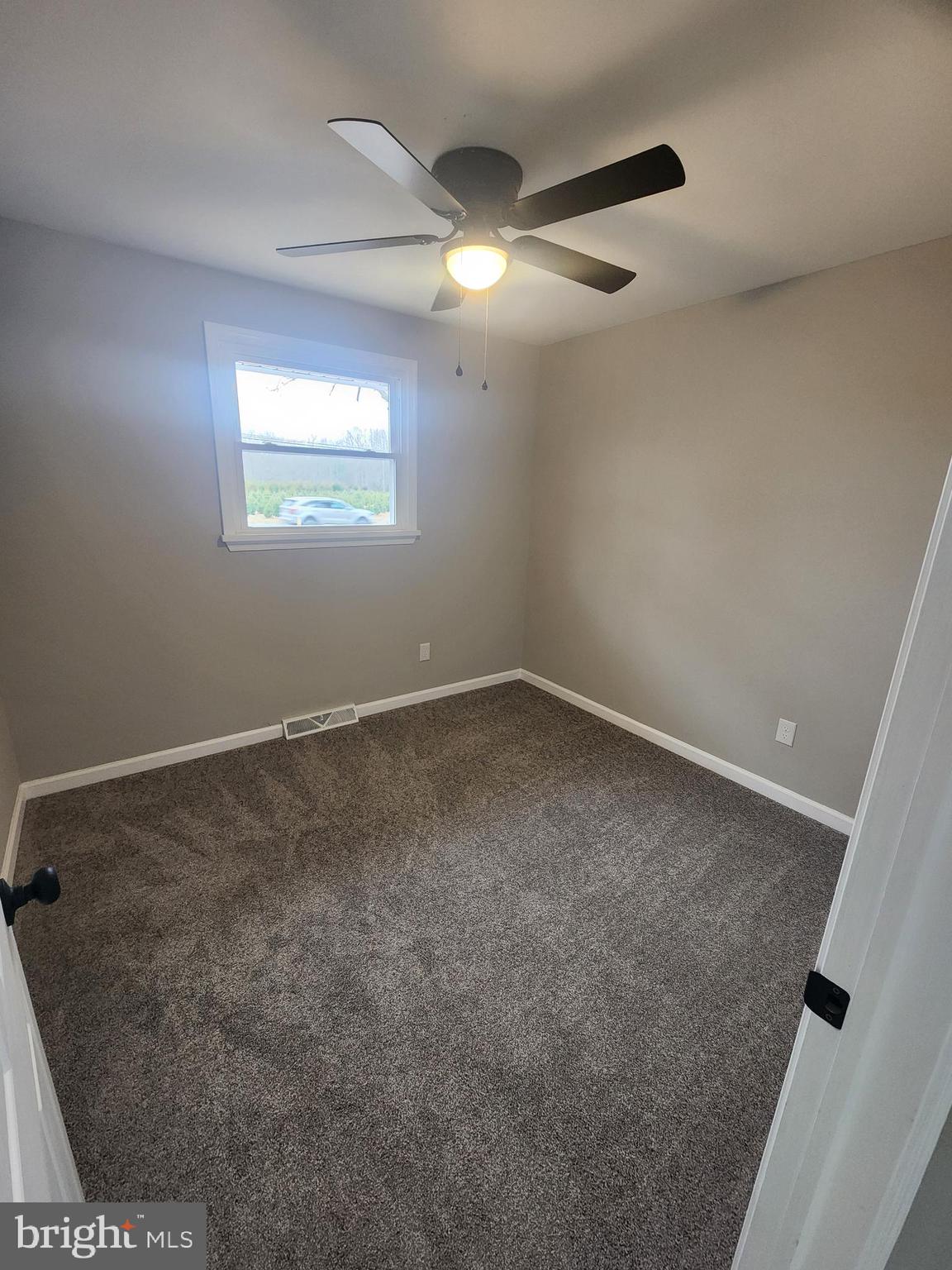 496 Big Oak Road Bridgeton, NJ 08302 - Photo 20 of 31 an empty room with a empty space and windows