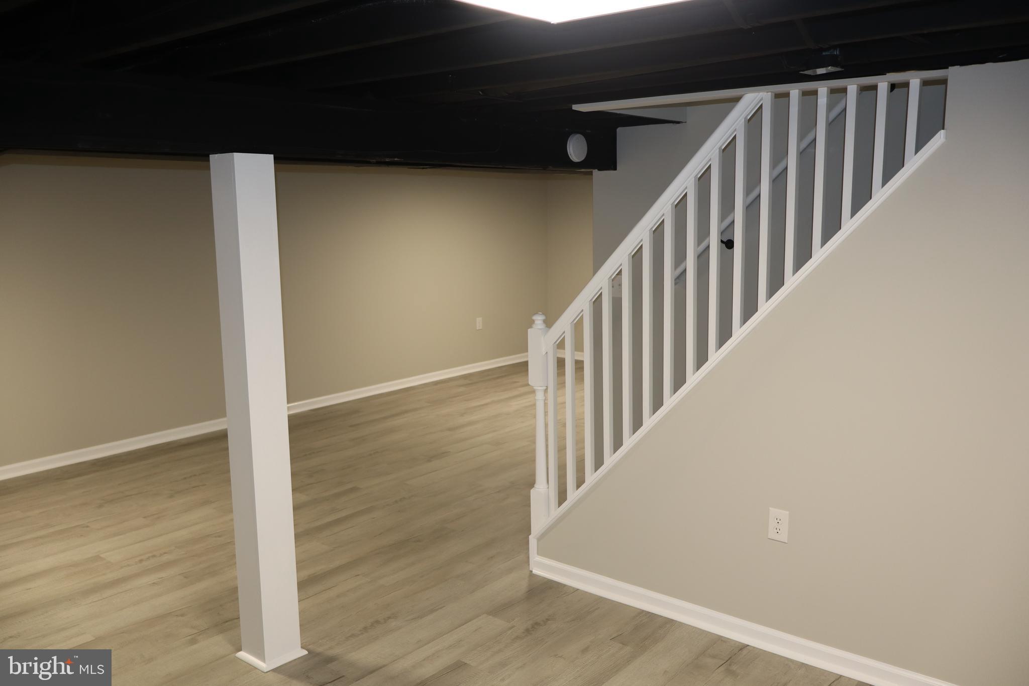 496 Big Oak Road Bridgeton, NJ 08302 - Photo 24 of 31 a view of staircase with wooden floor and white walls