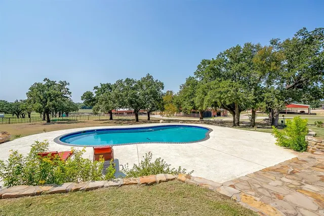 a view of outdoor space yard and swimming pool