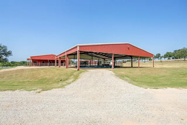 a view of swimming pool with outdoor seating and yard
