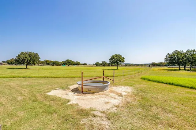 a view of a swimming pool with an ocean