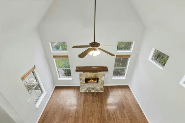 a view of hallway with wooden floor