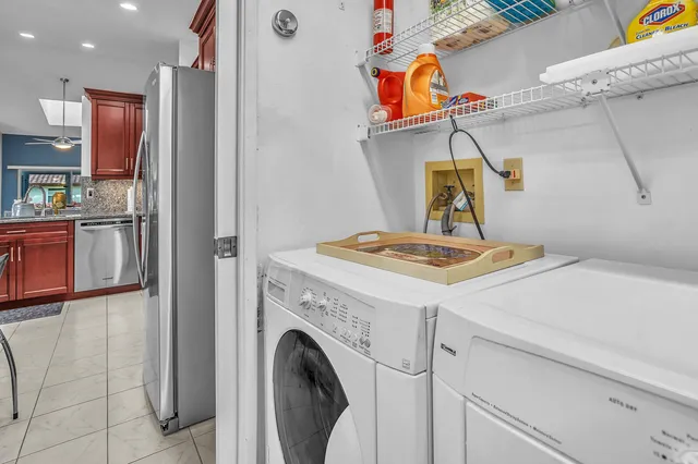 a utility room with dryer and washer