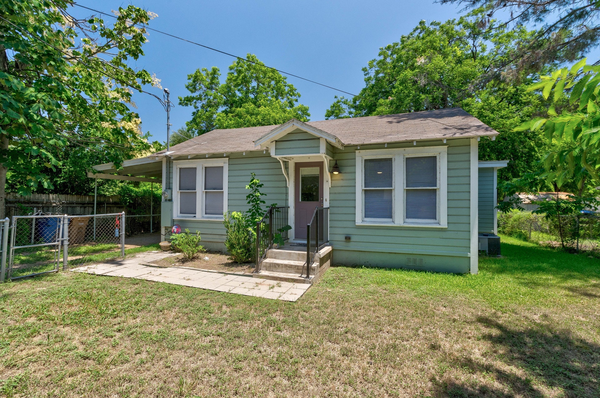 5406 Bolm Road Austin, TX 78721 - Photo 1 of 1 a view of a house with backyard and a garden