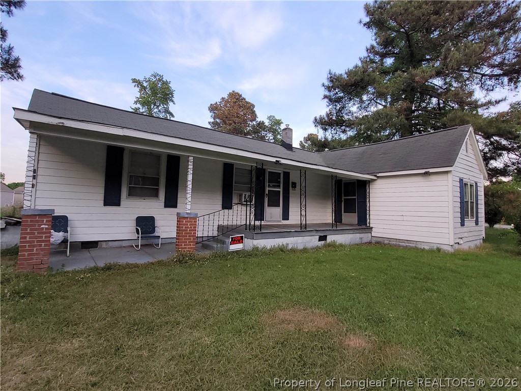 39 Durant Road Wilson's Mills, NC 27527 - Photo 1 of 11 a front view of house with yard