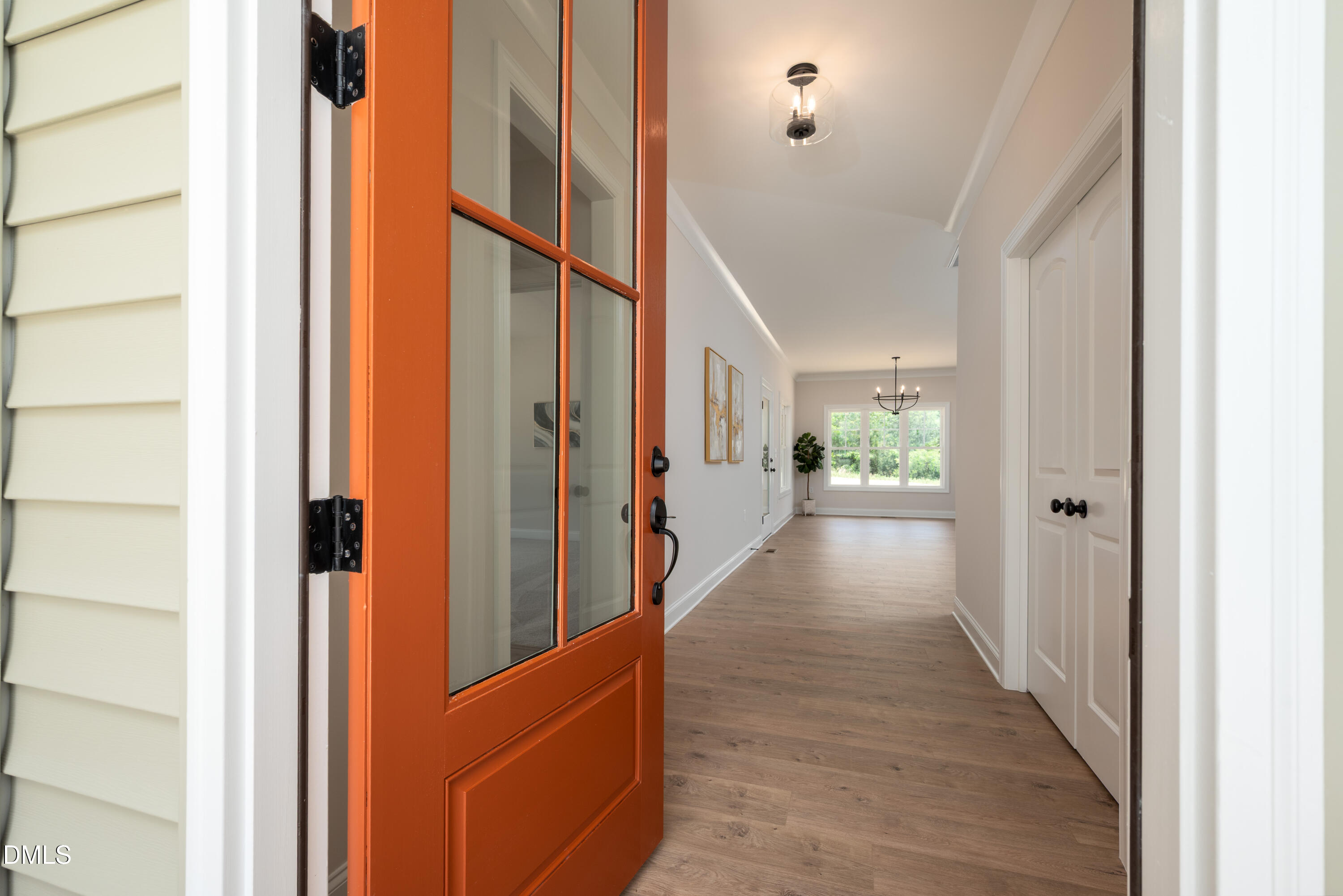 2275 Peachtree Hills Road Spring Hope, NC 27882 - Photo 8 of 43 a view of a hallway with wooden floor and staircase
