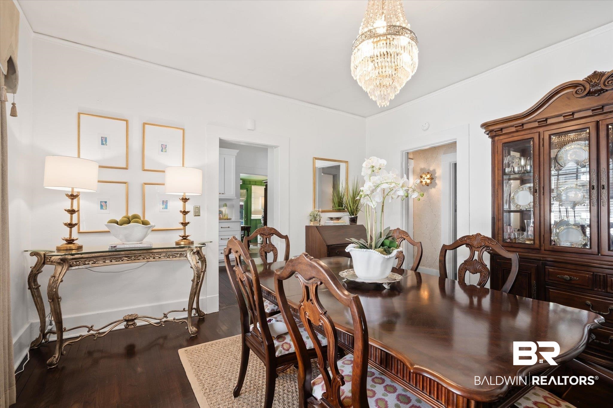 115 Bienville Avenue Mobile, AL 36606 - Photo 5 of 19 Dining area with hardwood / wood-style flooring and a chandelier