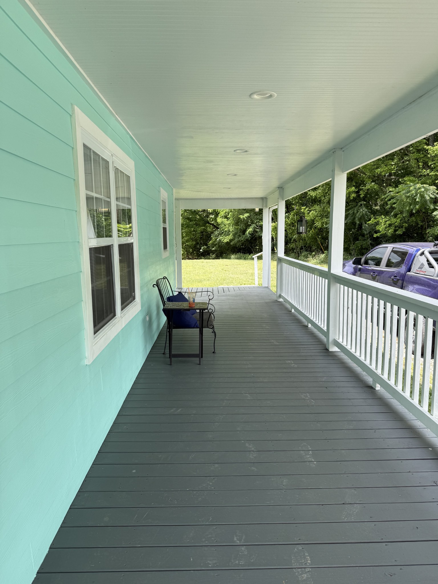 581 Shady Grove Road Bloomington Springs, TN 38545 - Photo 30 of 42 a view of a chairs and table in balcony