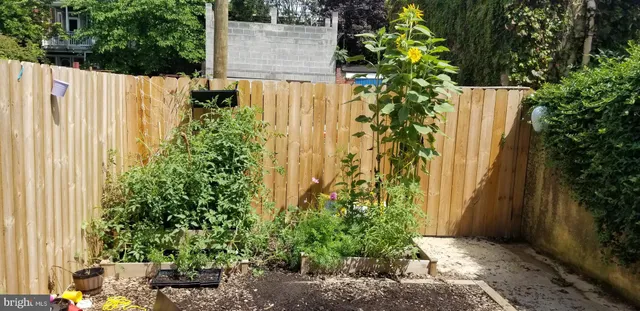 a view of a house with iron stairs