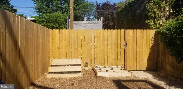 a front view of a building with parking space