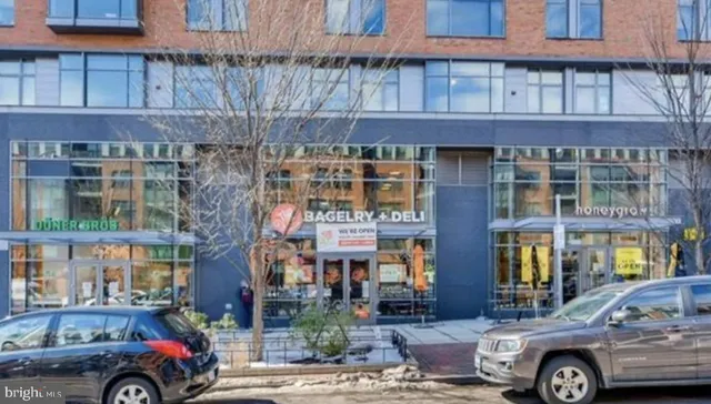 a view of a building with a street