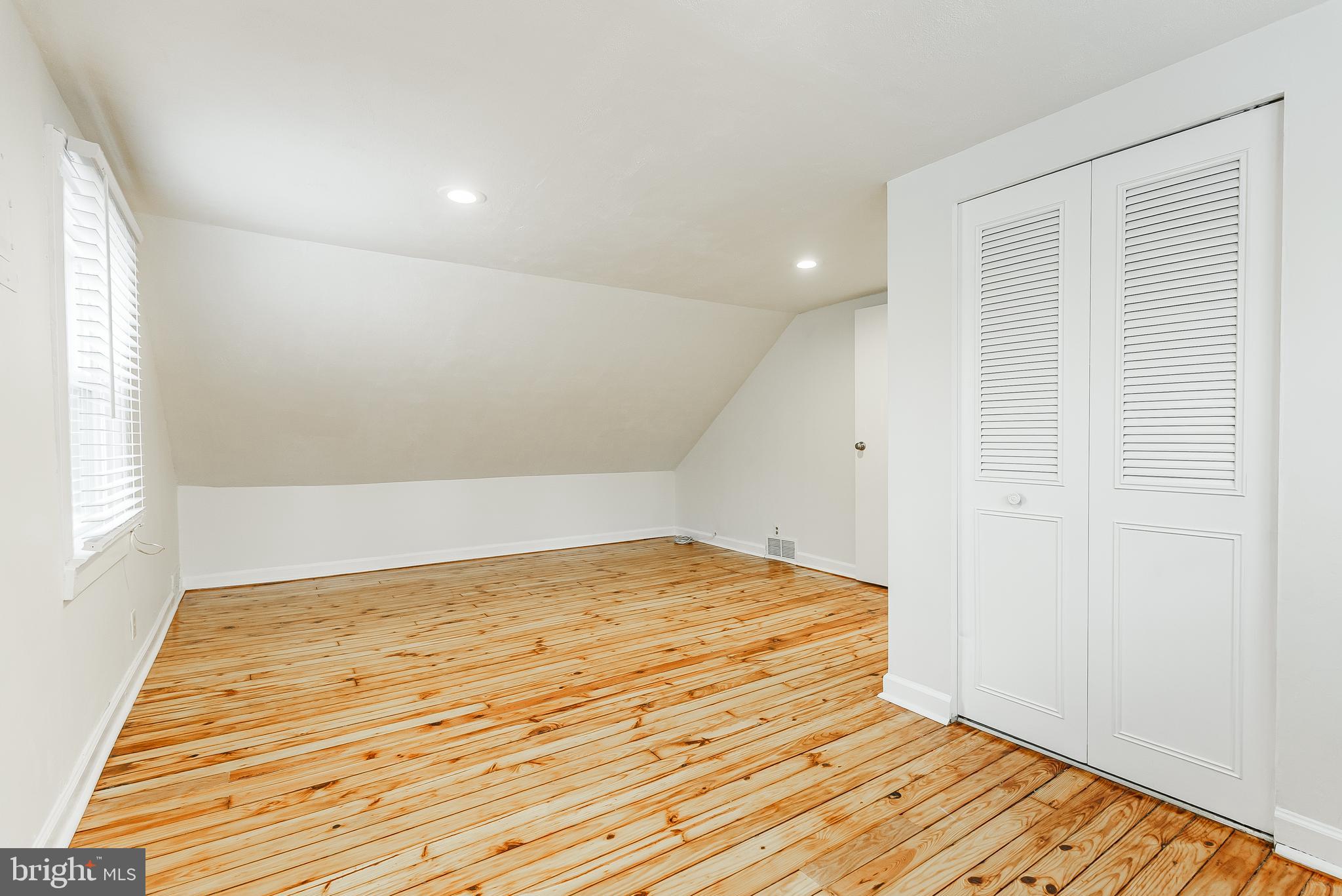 431 Central Avenue Glenside, PA 19038 - Photo 13 of 15 a view of empty room with wooden floor and fan