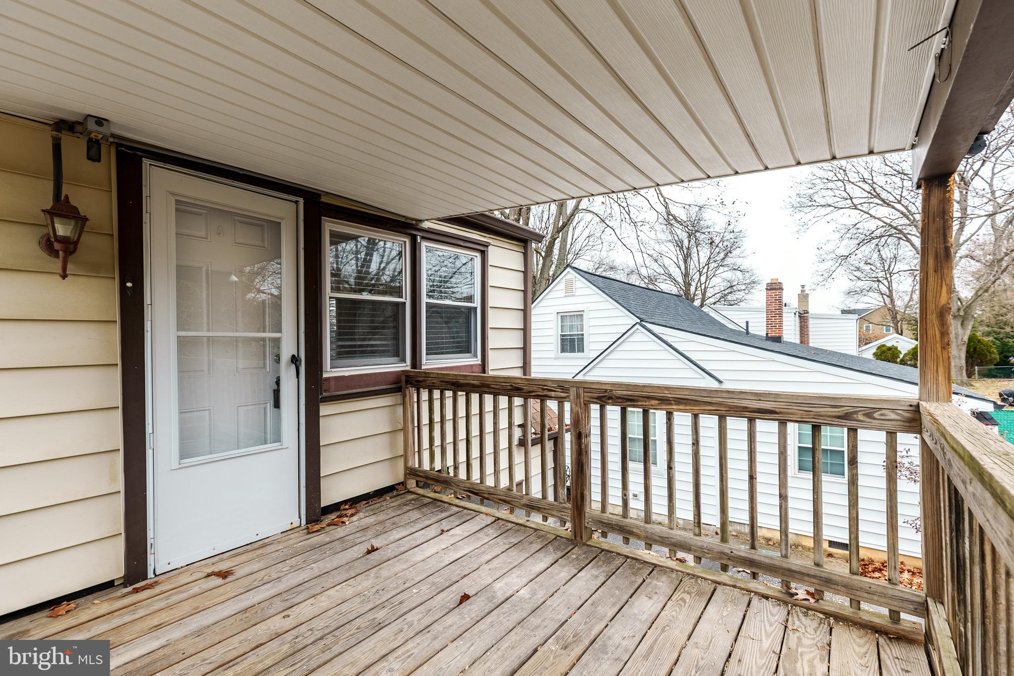 431 Central Avenue Glenside, PA 19038 - Photo 4 of 15 a porch with wooden floor and outdoor space