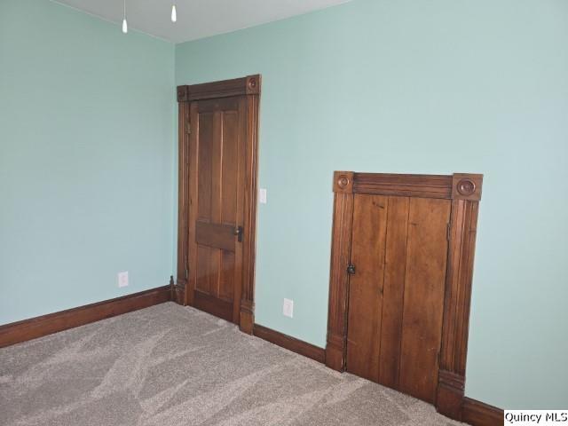 210 Main Street Carthage, IL 62321 - Photo 22 of 36 an empty room with closet area