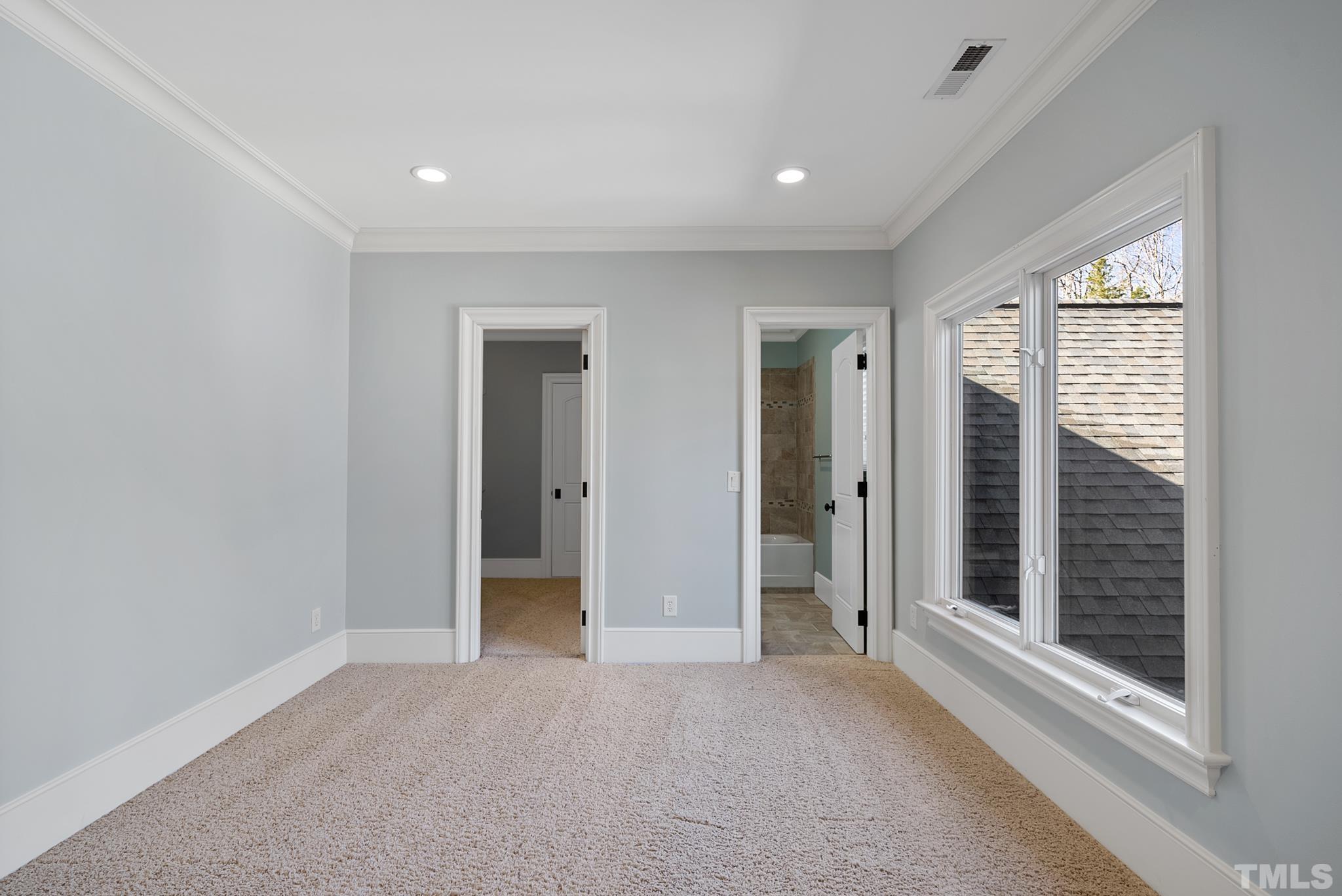 6009 Over Hadden Court Raleigh, NC 27614 - Photo 38 of 54 Stone wine cellar w/elegant solid custom door entry.