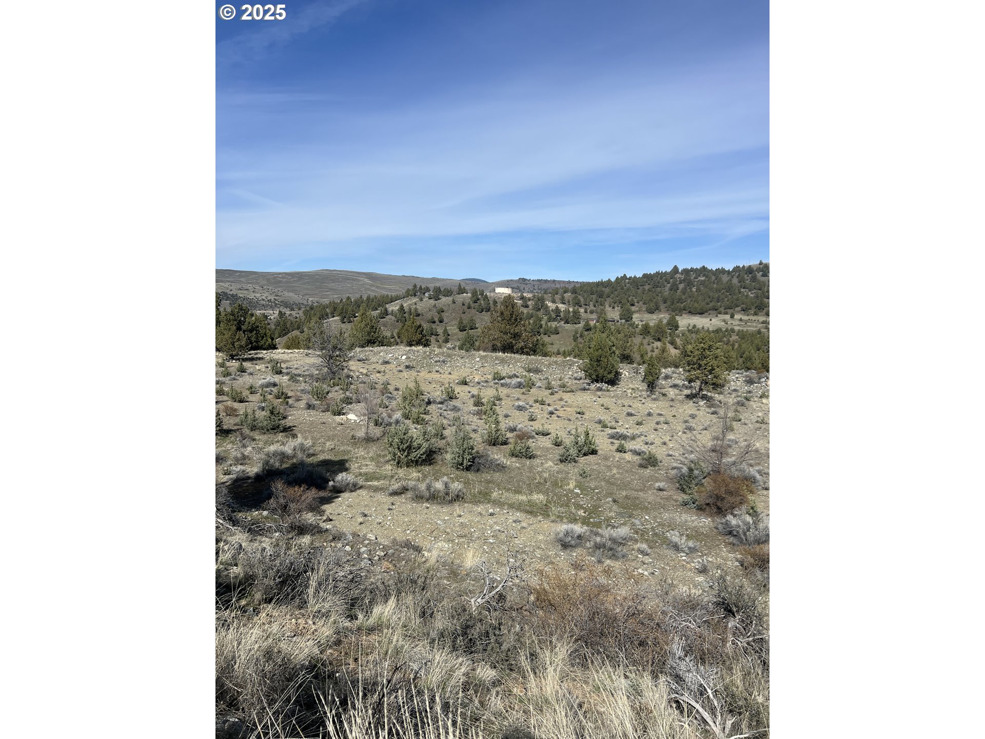 Blue Gulch Road John Day, OR 97845 - Photo 5 of 44 a view of a sky view of a field