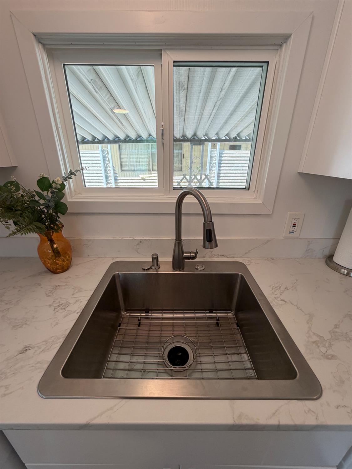 9060 Auburn Folsom Road, Unit 19 Granite Bay, CA 95746 - Photo 8 of 30 a bathroom with a sink and a window