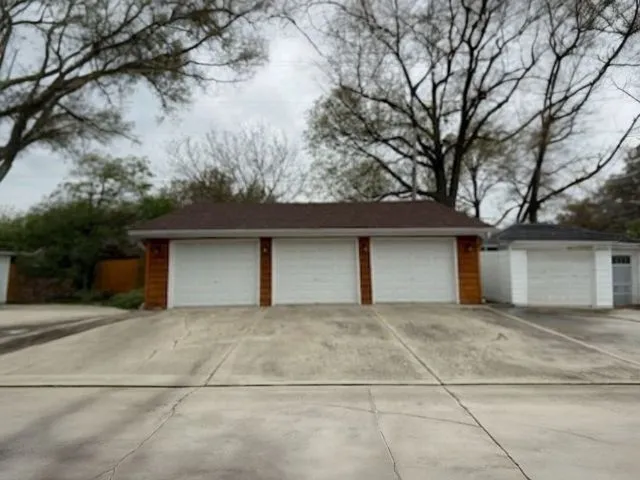 a kitchen with stainless steel appliances granite countertop a refrigerator sink and cabinets