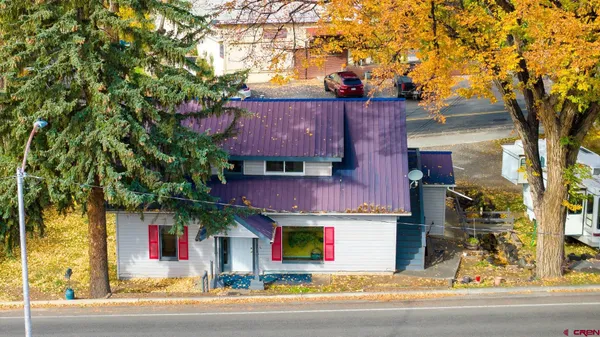 front view of a house with a small yard