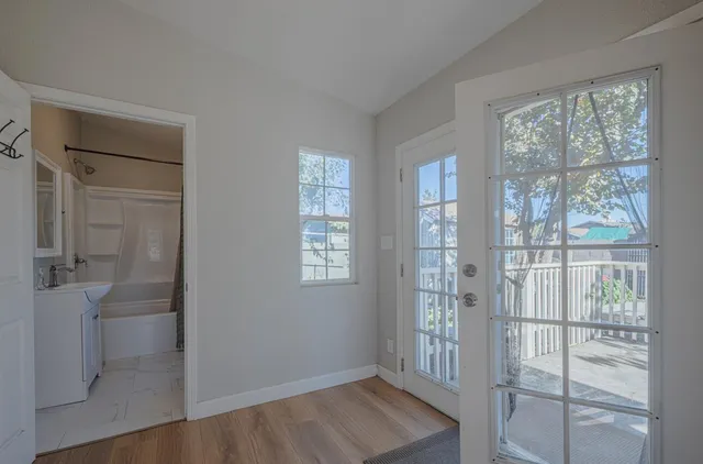 a view of entryway with wooden floor
