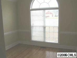 3614 Haigler Road Monroe, NC 28110 - Photo 3 of 7 a view of an empty room and a window