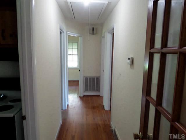 508 Doby Circle Raleigh, NC 27610 - Photo 5 of 13 a view of a hallway with wooden floor