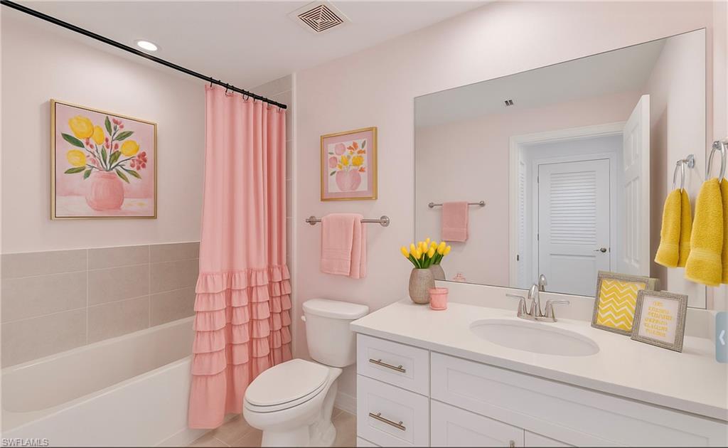 43981 Boardwalk Loop, Unit 2225 Punta Gorda, FL 33982 - Photo 15 of 48 a bathroom with a sink mirror vanity and toilet