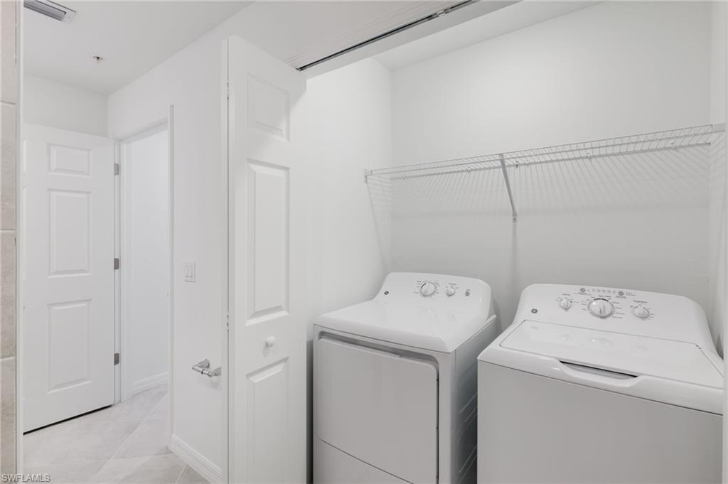 43981 Boardwalk Loop, Unit 2225 Punta Gorda, FL 33982 - Photo 18 of 48 a utility room with dryer and washer