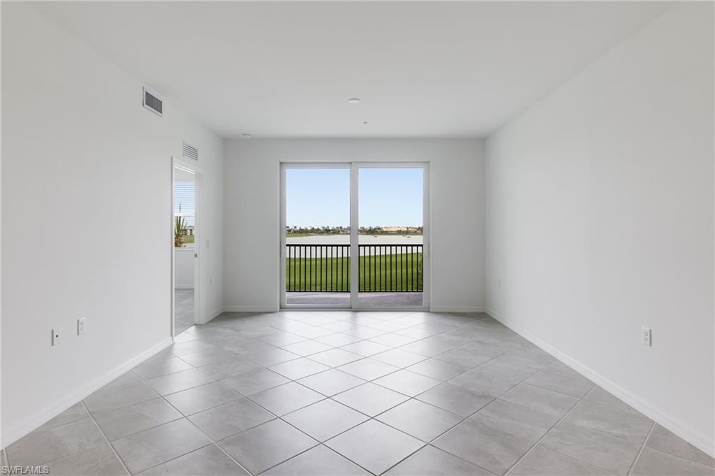 43981 Boardwalk Loop, Unit 2225 Punta Gorda, FL 33982 - Photo 21 of 48 an empty room with a empty space and a window