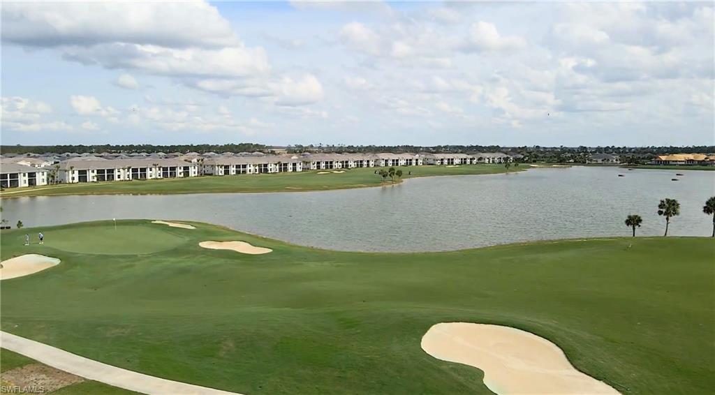 43981 Boardwalk Loop, Unit 2225 Punta Gorda, FL 33982 - Photo 32 of 48 a view of a lake with a city