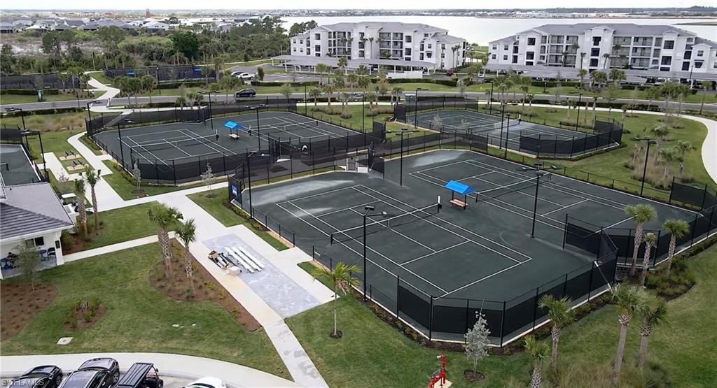 43981 Boardwalk Loop, Unit 2225 Punta Gorda, FL 33982 - Photo 35 of 48 a view of a lake with a house