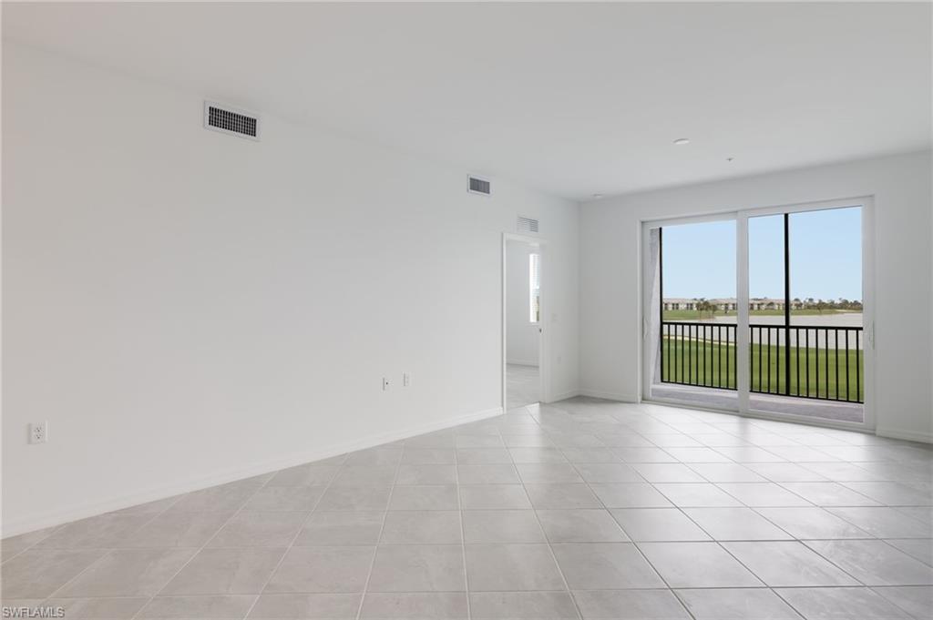 43981 Boardwalk Loop, Unit 2225 Punta Gorda, FL 33982 - Photo 4 of 48 an empty room with windows