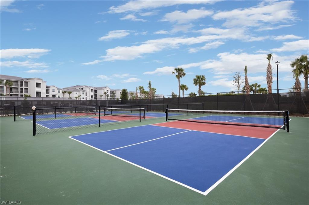 43981 Boardwalk Loop, Unit 2225 Punta Gorda, FL 33982 - Photo 41 of 48 a view of tennis court with houses