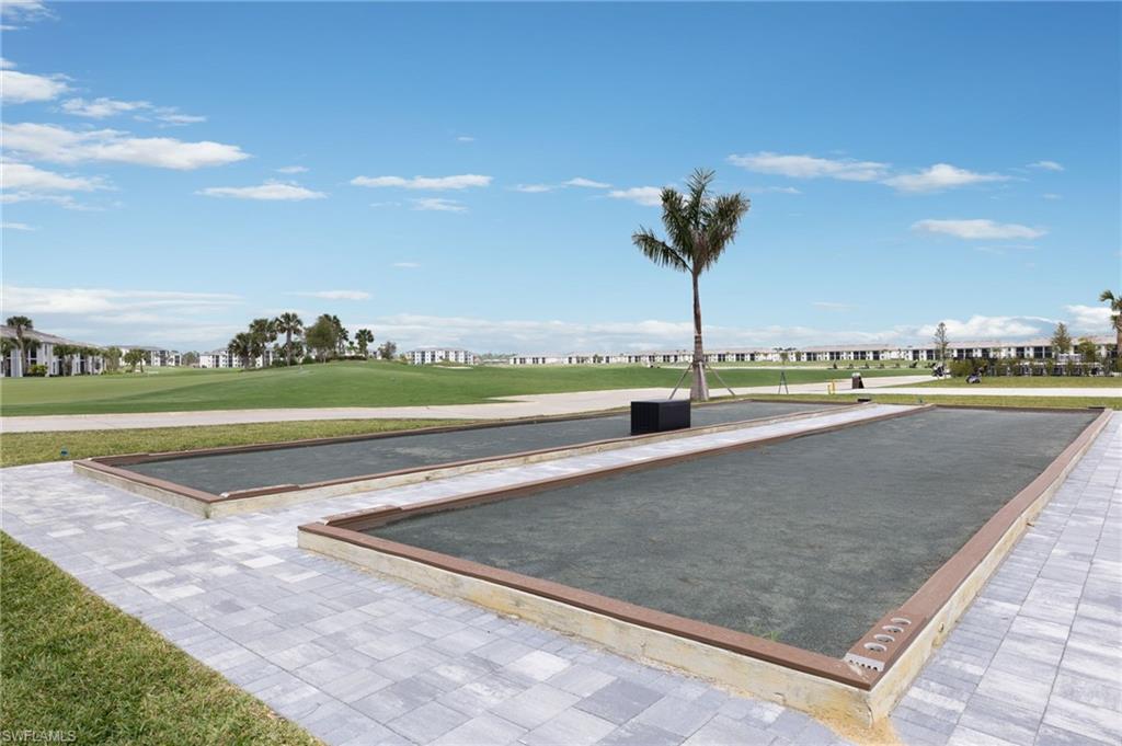 43981 Boardwalk Loop, Unit 2225 Punta Gorda, FL 33982 - Photo 43 of 48 a view of a swimming pool and a yard