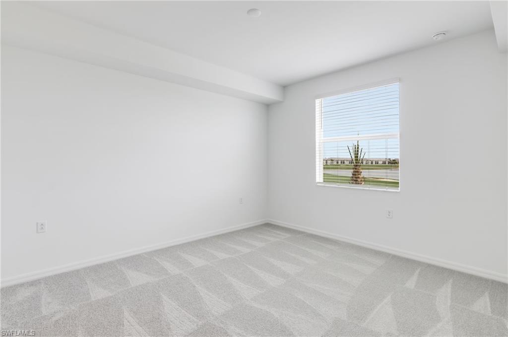 43981 Boardwalk Loop, Unit 2225 Punta Gorda, FL 33982 - Photo 10 of 48 an empty room with windows