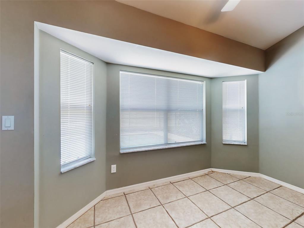 116 Wood Ridge Trail Sanford, FL 32771 - Photo 15 of 49 a view of an empty room with a window