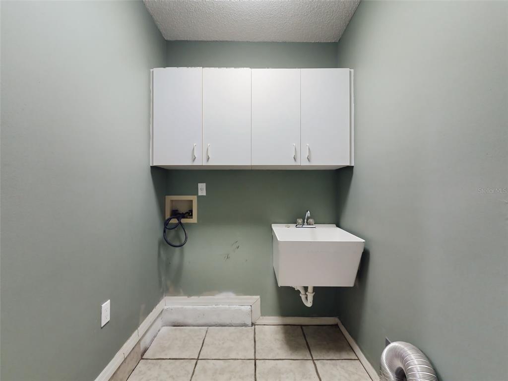 116 Wood Ridge Trail Sanford, FL 32771 - Photo 17 of 49 a bathroom with a sink and a toilet
